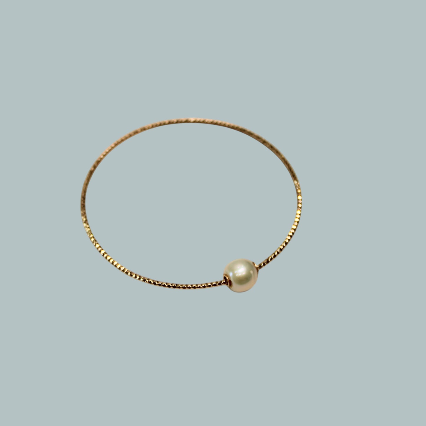 CELINE floating pearl bangle