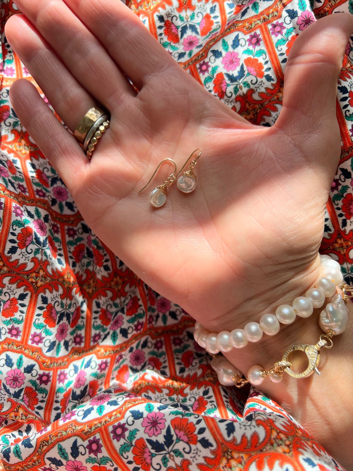 TSJ gold-tone freshwater pearl drop earrings with baroque pearls wire-wrapped with gold metal.